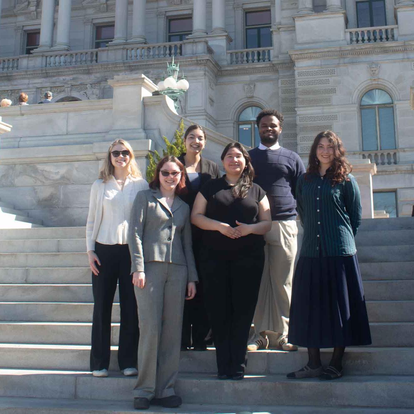 people standing in front of Library of Congress