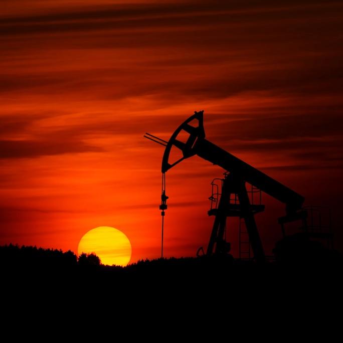 		Sunset with a pump mining crude oil
	