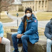 Three students on the Arts Quad