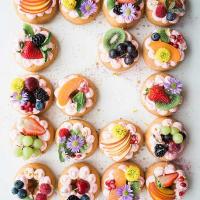 Donuts decorated with fruit and flowers