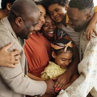 Family gathering for a group hug