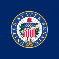 Flag in the center of a circle with "E Pluribus Unum" across it
