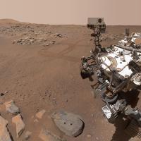 example thesis research questions Metal machine with wheels on a rocky landscape