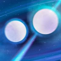  Two white orbs on a blue background