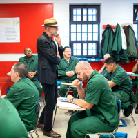  Professor Joe Margulies interacts with his students at Cayuga Correctional Facility in Moravia, New York