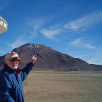  Riccardo Giovanelli pointing at site for telescope