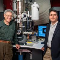  faculty with new electron microscope