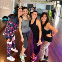  Smiling after an intense (and sweaty!) class with my Zumba mentors at my hometown studio.