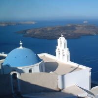  White Greek building against a blue sea: island of Santorini 