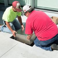  Workermen installing the time capsule