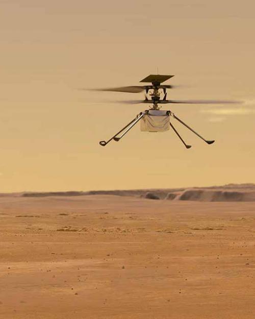 small helicopter flying over a barren, orange landscape