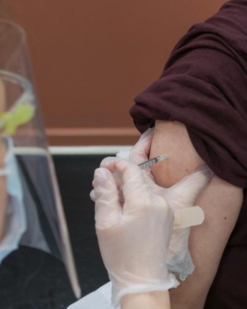 Person receiving vaccine