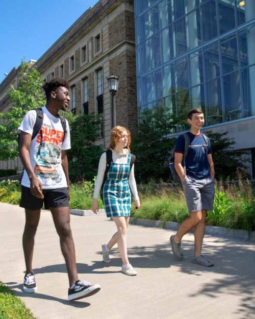 		Students in the Pre-Collegiate Summer Scholars Program walking past the Physical Sciences Building
	
