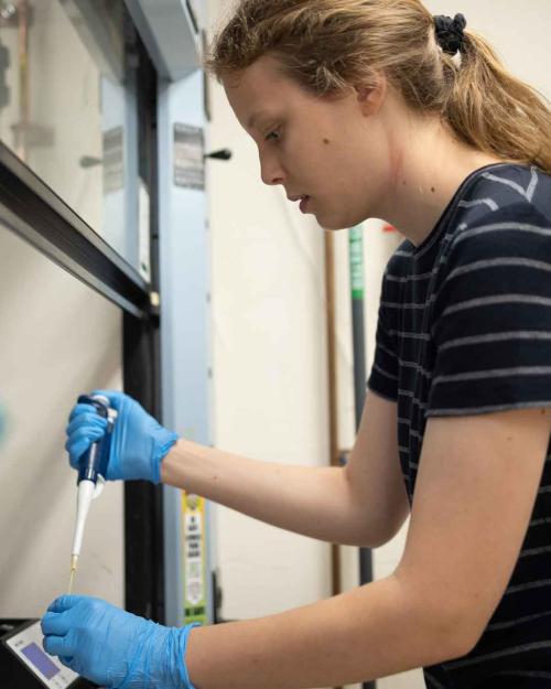 woman with lab equipment