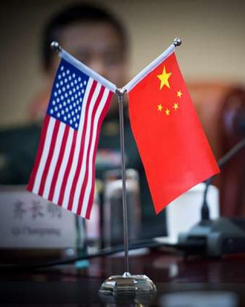 Two small flags on a table top