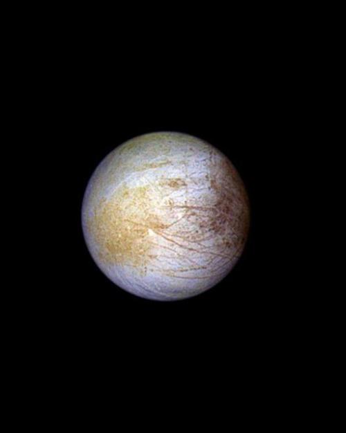 Two spheres against a dark background: images of a moon