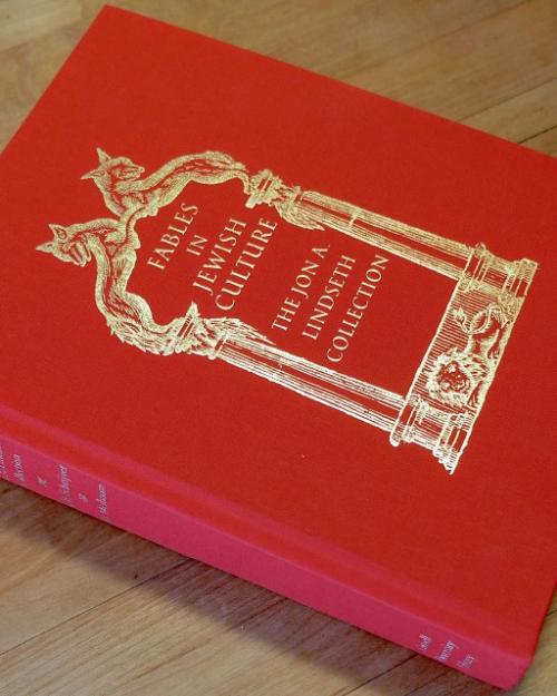 		red book on table
	