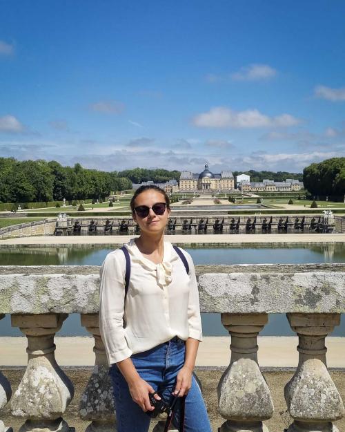 person standing on a bridge