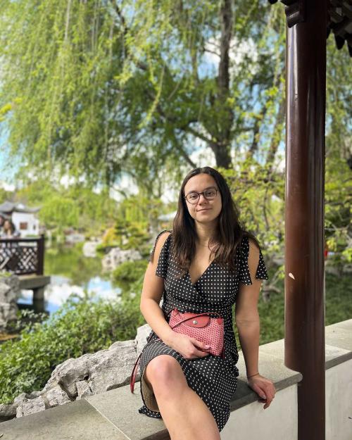 person sitting on a wall outside