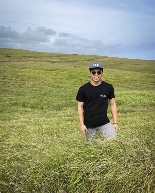 person walking in a field