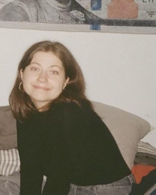 girl sitting on couch