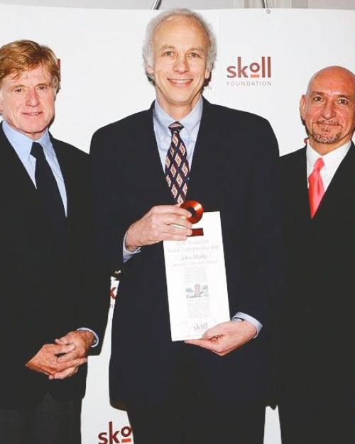 		Three people wearing suits
	