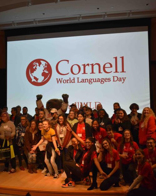 Students in front of Screen that says Cornell World Languages Day