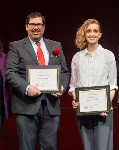 Five people hold awards