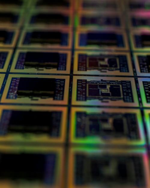 		rows of dark squares surrounded by rainbowed edges
	
