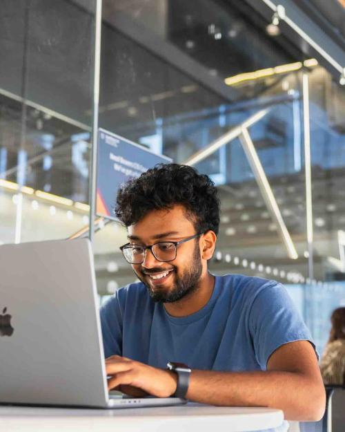 		person sitting at computer
	