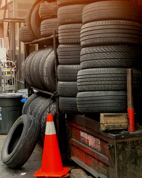 		Tall stacks of old car tires
	