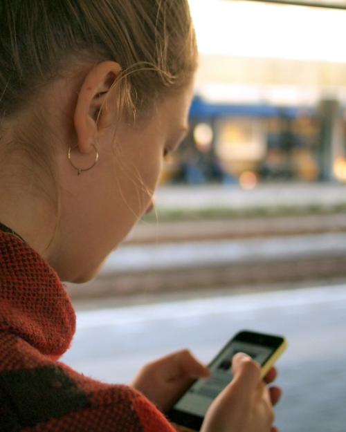 Person holding a smart phone