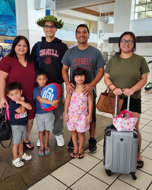 group of people with suitcases