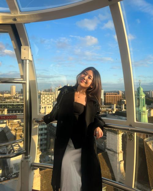 person with city in the background