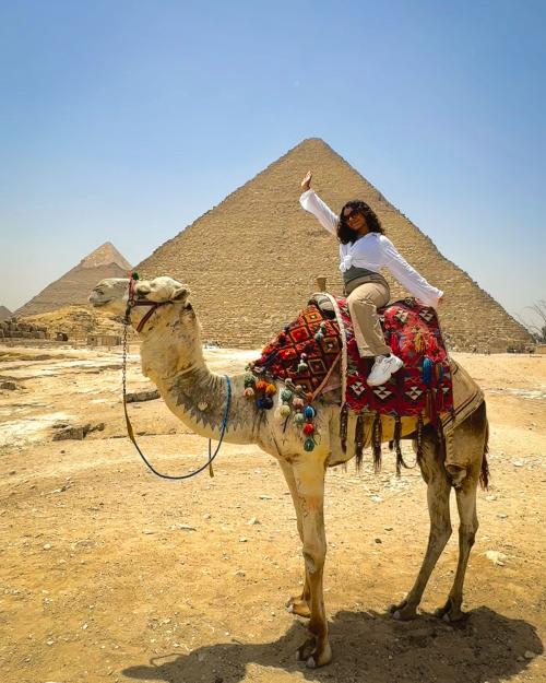 person riding a camel