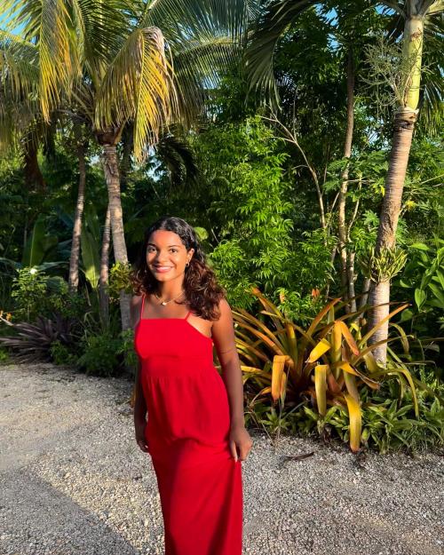 person outside in tropical location