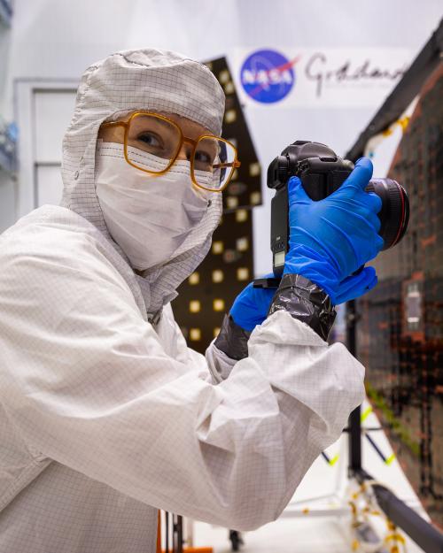 person in protective lab gear
