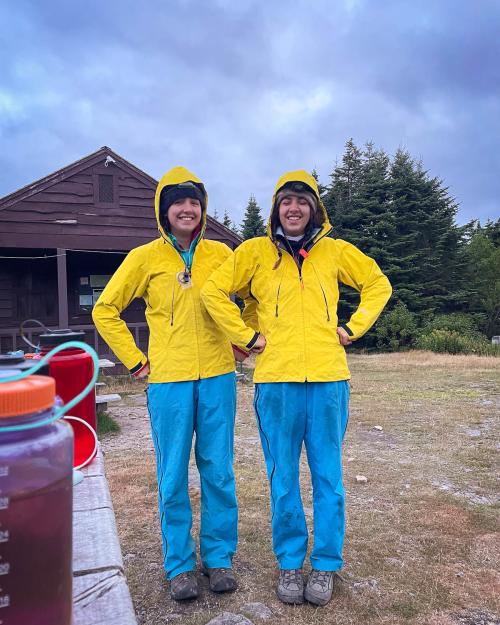 two people in yellow raincoats