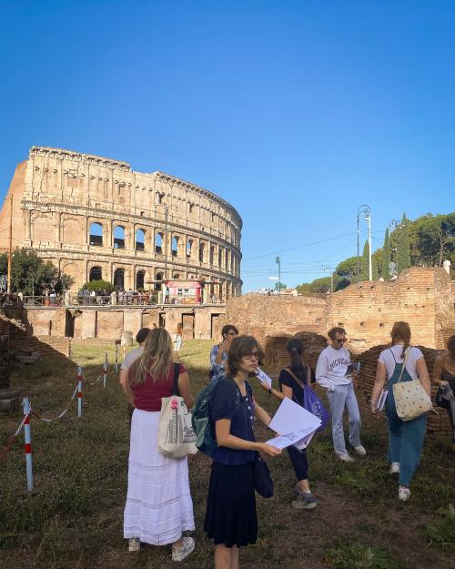 person standing near ancient buildings