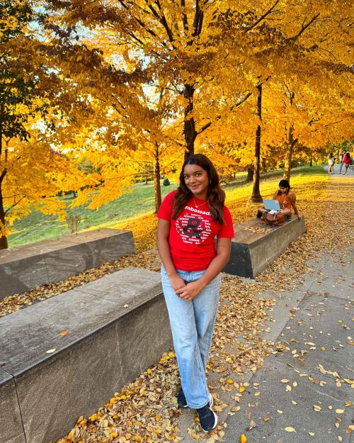 person standing outside in fall