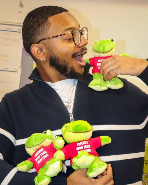 person with stuffed animals