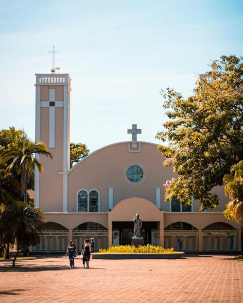 Building with a cross on top, blue ksy