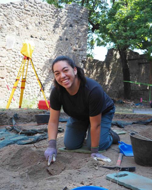 person at archaeological dig