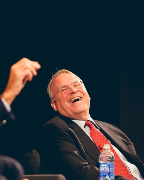 Two people laughing together