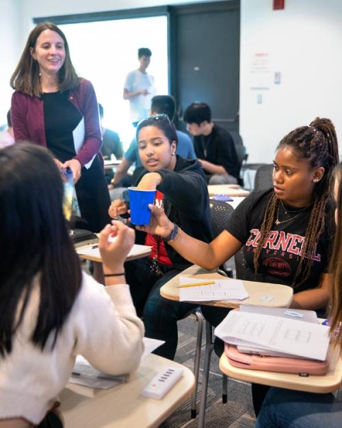 		professor and students in a classroom
	