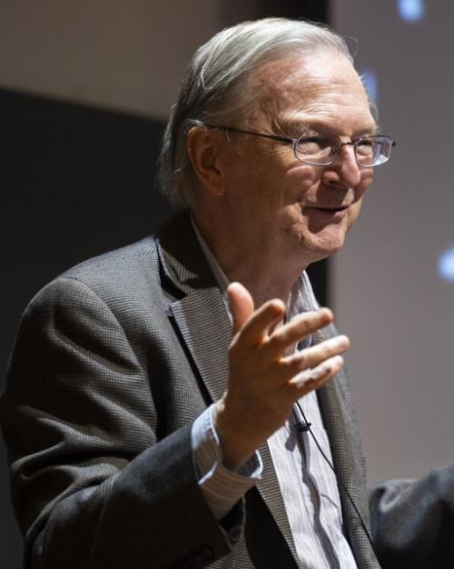 person with screen behind