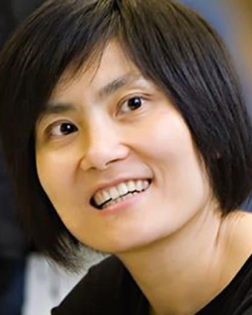 Jane Wang's face, with short dark hair and a smile.
