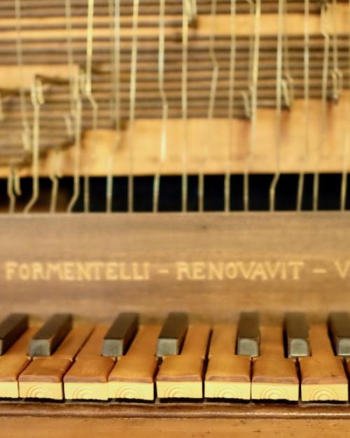 		yellowed musical instrument keyboard keys 
	