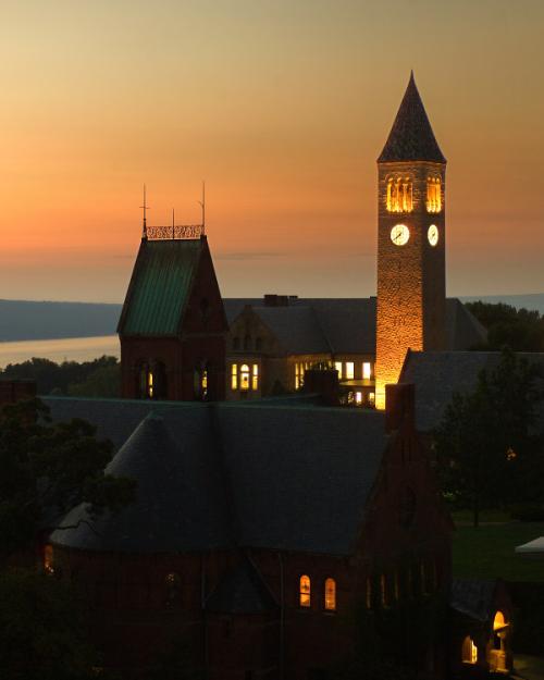 College campus buildings with lights on at dusk