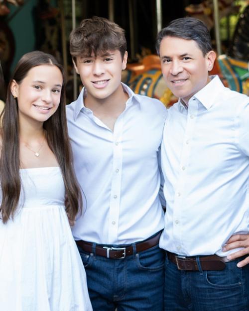 A family of four in a posed picture